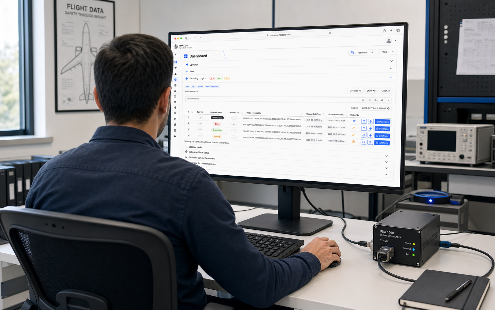 Flight data specialist using a compact data reader and the FDACore interface to decode recorded aircraft data